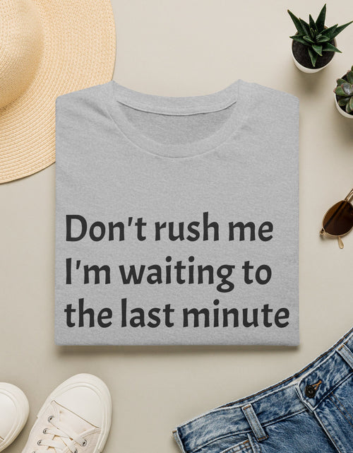 Load image into Gallery viewer, Black Graphic T‑Shirt — Subtle Text 'Don't Trust Me I'm Walking to the Last Minute'
