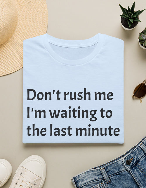 Load image into Gallery viewer, Black Graphic T‑Shirt — Subtle Text 'Don't Trust Me I'm Walking to the Last Minute'
