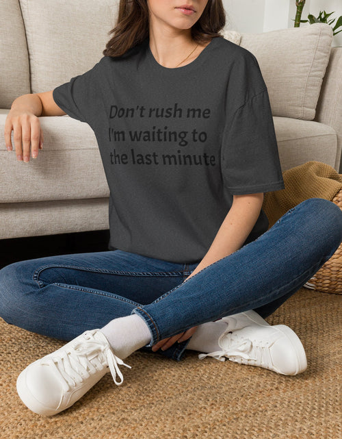 Load image into Gallery viewer, Black Graphic T‑Shirt — Subtle Text 'Don't Trust Me I'm Walking to the Last Minute'
