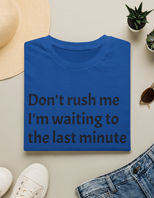 Load image into Gallery viewer, Black Graphic T‑Shirt — Subtle Text 'Don't Trust Me I'm Walking to the Last Minute'

